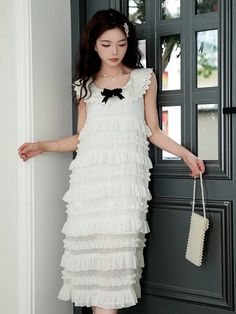 This price is for a nightgown only, others are not included. Dress / Top Details:Bowknot Details / Lace TrimMaterial:Polyester / SpandexNeckline:Round NeckSkirt Details:Tiered Ruffles / Tiered Skirt and Flounce HemSkirt Length:Midi Length  	 		 			Size 			S 			M 			L 		 		 			Full Length 			103 			104 			105 		 		 			Bust 			84 			88 			92 		 		 			Shoulders 			32 			33 			34 		 		 			Height 			155-160cm 			160-165cm 			165-170cm 		 		 			Weight 			60KG 			70KG 			80KG White Ruffled Sleepwear For Summer, Sleeveless Ruffled Nightgown For Spring, Summer Ruffled Dress For Sleepover, Summer Ruffle Dress For Sleepover, Sleeveless Ruffled Dress For Sleepover, White Ruffled Nightgown For Sleepover, White Sleeveless Ruffled Sleepwear, White Ruffled Sleepwear, White Sleepwear With Ruffles