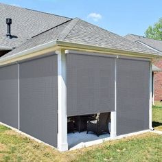 an outdoor living area with a covered patio