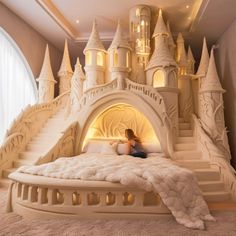 a woman is sitting on a bed made to look like a castle with stairs and turrets