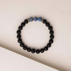 Benefits The Blue Regalite Himalayan Stone Bracelet includes both Lava Stone beads and Blue Regalite beads. Blue Regalite is a grounding, strengthening stone that promotes stability, clarity, and inner-peace, making it ideal for encouraging compassion, contentment, and tranquility. The lava stone also known as “basalt” is a porous volcanic rock that has been solidified from molten lava after conditions of intense heat and pressure. Materials We carefully design, test and ensure the quality of ou Adjustable Sodalite Beaded Bracelets With 8mm Beads, Adjustable Lapis Lazuli Beaded Bracelets For Everyday, Spiritual Sodalite Gemstone Beaded Bracelets, Sodalite Round Beads Bracelets For Healing, Spiritual Lapis Lazuli Beaded Bracelet With Natural Stones, Healing Lapis Lazuli Beaded Bracelets With Natural Stones, Meditation Bracelets With Natural Lava Stones, Lapis Lazuli Round Beads Bracelets For Meditation, Healing Lava Stone Bracelets With Gemstone Beads