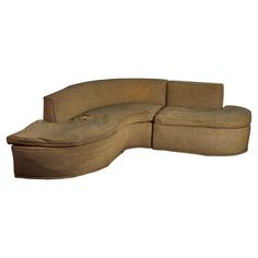 the curved couch is made out of fabric