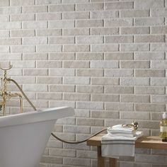 Tribeca by Ceramica Rondine is 2" x 10" Brick Look Subway Wall tile, made and imported from Italy. This Porcelain subway tile replicates the look of real bricks but available in a extremely durable Matte Textured Finish. Can be used on any backsplash, wall, floor, pool, interior and exterior application. Elevate your interior or exterior spaces by pairing this Italian Brick Look Subway Floor and Wall Tile from our collection with a variety of outstanding floor and wall tile options offered by En Brick Effect Tiles, Textured Tiles, Types Of Bricks, Brick Look Tile, Topps Tiles, Hotel Office, Zellige Tile, Tile Saw, Air Purifying