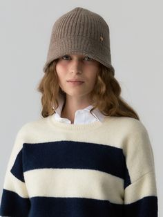 Editor's NoteDEPOUND proposes a leisurely lifestyle by incorporating natural beauty into products frequently used in daily life.- Bucket + beanie style- Vertically ribbed pattern- Flared rim design- Circular metal logo plate embellished- Comfortable and flexible fit hand-knitted item- Cozy and casual moodMeasurements(in.)One Size- Circumference: 22.64 in. Composition & Care- Material: 60% Wool, 30% Nylon, 5% Acrylic, 5% Rayon- Dry cleaning recommended- Wash separately with a neutral det Fall Ribbed Beanie, Ribbed Beanie Hats For Fall, Ribbed Beanie For Fall, Ribbed Cap For Cold Weather, Classic Ribbed Hat For Cold Weather, Fall Ribbed Cap, Winter Bucket Hat For Everyday Use, Cold Weather Ribbed Hats, Casual Cream Bonnet