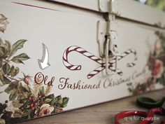 an old fashioned christmas card box with candy canes