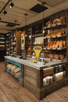 the interior of a bakery with lots of bread