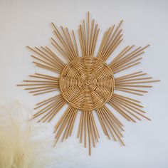 a wall decoration made out of bamboo sticks