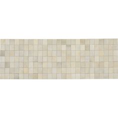 a white tile wall with squares on it