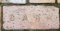 the bricks have writing on them that spell out ba's