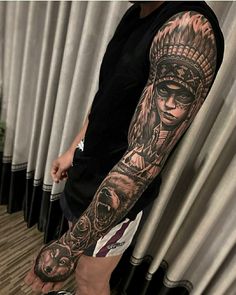 a man with a tattoo on his arm