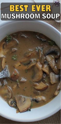 a white bowl filled with mushroom soup on top of a table