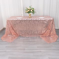 [About] Quantity: 1 Rectangle Tablecloth Material: Sequin on Mesh Base Color: Blush Rose Gold Style: Sparkly Wave Pattern Size: 90" x 156" Edges: Hemmed Gives floor length hang on standard 8ft (96"x30") rectangle table. Seamless, 1pc design [Information] Additional Information: Listing is for Rectangle Tablecloth Only, Other decorations are not included. How to Care: Hand wash or spot clean with a soft damp cloth. Do not dry clean or machine wash. Uses: Perfect for any Themed Events, Hotels, Res 8 Foot Table, Sequin Tablecloth, Sequin Pattern, Gold Waves, Rectangle Tablecloth, Themed Events, Rectangle Table, Elegant Flowers, Blush Roses