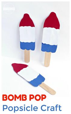 popsicle craft with the words bomb pop on it and two red white and blue popsicles