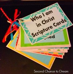 a pile of cards with the words who i am in christ scripture cards red on them