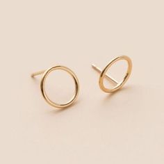 We couldn't miss adding the Circle to our family of geometric earrings. Everything comes full circle eventually. You can wear these circle of golden warmth solo or as a great addition to a second hole. Details:Location: EarlobeStyle: Minimalist/DaintyMade with: 14K Gold FilledBacks: Classic Butterfly Full Circle, Geometric Earrings, The Circle, Post Earrings, Gold Filled, 14k Gold, Gold