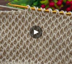 the video is showing how to crochet