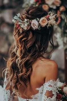 a woman with long hair and flowers in her hair