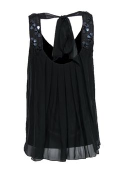 Add some dark bohemian vibes to your closet with this romantic top from Rebecca Taylor! Made with light and airy silk, this sleeveless beauty features floral patterned beading along the scoop neckline and a relaxed, pleated silhouette to keep you comfortable and stylish all day. Size 4 100% Silk Scooped, plunge neckline Floral beading around neckline Relaxed, pleated silhouette Tied back accent Fully lined, no closures Waist 32" Total length 26" Black Silk Sleeveless Tank Top, Sleeveless Chiffon Blouse For Party, Elegant Sleeveless Flowy Top, Elegant Flowy Sleeveless Top, Chic Embellished Silk Top, Flowy Summer Evening Blouse, Flowy Sleeveless Party Blouse, Flowy Sleeveless Blouse For Party, Embellished Sleeveless Silk Blouse