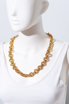 This is a bold vintage statement necklace by Monet. The necklace is chain link with varying details on each chain. The necklace closes with a hook and eye closure.  The necklace measures 24.5" long. The original Monet tag is attached! This piece will definitely turn heads! Look at how it sparkles!! For all vintage treasures: We love finding unique pieces for you, and we disclose as much detail as possible in our listings. However, since these are pre-loved items, occasional minor imperfections might go unnoticed. If you'd like more photos, specific measurements, or a video to ensure a perfect fit, feel free to contact us before buying! We offer first-come, first-served vintage finds. Additional Notes: Our smoke-free, pet-free environment ensures your treasures arrive fresh. While we use pr Vintage Gold Toggle Chain Necklace, Vintage Gold-tone Oval Link Necklace, Costume Jewelry Chain Necklace With Chunky Chain Link, Chunky Chain Link Necklace In Costume Jewelry, Vintage Chunky Chain Necklace As Gift, Vintage Style Chunky Chain Necklace As Gift, Chunky Chain Link Necklace Costume Jewelry, Vintage Double Chain Link Jewelry, Vintage Double Chain Jewelry