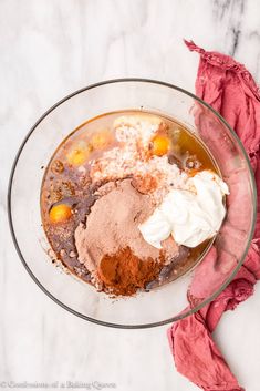 ingredients in a glass bowl on a marble surface