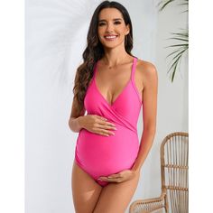 Elevate your maternity swimwear with these Women's Maternity Swimsuits. The wrap front design and adjustable crossback straps offer both style and support, making them ideal for pregnant women. The belly support feature ensures comfort and confidence, while the one-piece construction provides coverage and convenience. Perfect for summer beach outings, these swimsuits are a must-have for expecting mothers. Crafted from 85% Polyester and 15% Spandex, these swimsuits offer a comfortable stretch and Pink Swimwear With Built-in Bra For Swimming, Pink Sleeveless Tankini For Sunbathing, Sleeveless Pink Tankini For Sunbathing, Pink Stretch One-piece Swimsuit For Vacation, Pink Sleeveless Swimwear With Built-in Bra, Pink Stretch One Piece For Vacation, Pink Stretch One-piece For Vacation, Pink Stretch Vacation Swimsuit, Pink One-piece Swimsuit For Sunbathing