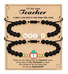 two black and white beaded bracelets with the words teacher on them, one is for