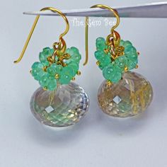 DESCRIPTION: Thank you for coming in! Spectacular 18K solid yellow gold earrings with fine 9.05 carat gem emerald melons and 32.7 carats fine golden rutilated quartz onions! It looks much much nicer in person! You'll get the pair of earrings you see! DIMENSION: 1.25 Inch Total Length. 15mm rutilate quartz, 4.5mm-5mm emerald. MATERIAL: 18K Solid Yellow Gold, Natural Emerald, Golden Rutilated Quartz. Elegant Green Briolette Gemstones, Formal Green Citrine Jewelry, Elegant Green Citrine Jewelry, Handmade Elegant Green Amethyst Jewelry, Elegant Handmade Green Amethyst Jewelry, Handmade Elegant Emerald Gemstones, Green High Luster Jewelry For Anniversary, Elegant Handmade Citrine Gemstones, Handmade Elegant Citrine Gemstones