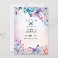 save the date card with butterflies and flowers in pastel colors on a marble background