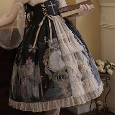 Get a spectacular look thanks to this Steampunk skirt, made with the greatest care. This stunning Steampunk skirt in a lolita style is made for women who pay attention to details. Its print depicts old clocks in a very fairy atmosphere. The skirt is high-waisted and gives a cinching effect. It is possible to adjust it thanks to the ribbons laced in the back. The dress is embellished with a beautiful tulle to provide volume and even more detail. The model in the pictures wears a crinoline underne Steampunk Skirt, Old Clocks, Steampunk Fashion, Lolita Fashion, Pay Attention, Victorian Dress, The Dress, Cotton Blend, Mesh