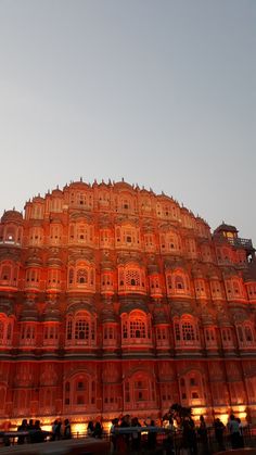 an ornate building lit up at night