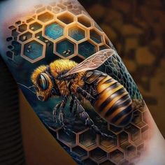 a tattoo with a bee on it and some honeycombs in the back ground