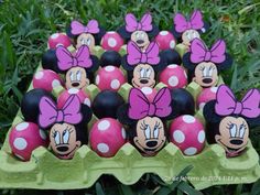 many minnie mouses are in an egg carton