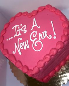 a heart shaped cake that says it's a new era