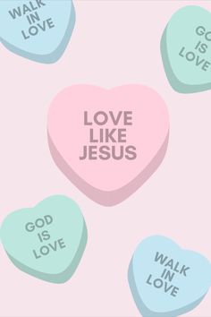 candy hearts with the words love like jesus and god is in love written on them