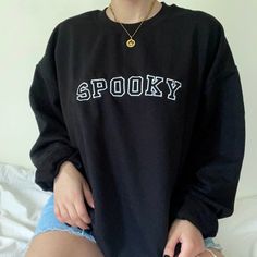 cotton/poly black crewneck. embroidered design. unisex adult sizing. these are made to order! please allow 2-4 weeks for shipment ᵕ̈ model is 5'5, usually a size small & wearing a size large. Black Fall Sweater For College, Black Fall T-shirt For College, Black Halloween Sweatshirt With Crew Neck, Black Crew Neck Halloween Sweatshirt, Black Crew Neck Sweatshirt For Halloween, Black T-shirt With Ribbed Cuffs For Fall, Black Crew Sweatshirt For Fall, Black Crew Neck Sweatshirt For Fall, Black Crew Neck Sweater For Fall