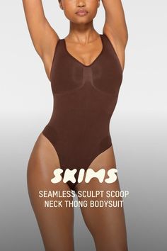 This scoop neck sculpting thong bodysuit enhances your natural shape while defining and smoothing your waist, core, tummy, and back. Features thick non-adjustable straps, center front and side stitching to define and support your bust, and a cotton gusset with snap closure. Fits true to size. | SKIMS Scoop Neck Thong Bodysuit | Deep Neutral | 2XS | Seamless Sculpt Solid Push-up Bodysuit With Medium Bust Support, Solid Color Push-up Bodysuit With Medium Bust Support, Solid Color Push-up Shapewear Bodysuit, Sculpting Push-up Shapewear Bodysuit, Solid Sculpting Shapewear With Seamless Construction, Sculpting Solid Shapewear With Lined Body, Solid Color Sculpting Shapewear With Lined Body, Seamless Push-up Bodysuit For Shapewear, Stretch Seamless Push-up Bodysuit