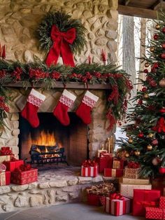 a fireplace decorated for christmas with stockings and presents