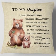 a pillow with an image of two bears and the words to my daughter