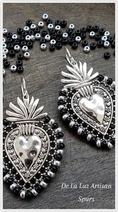 Spurs - Silver and Black Sacred Heart Earrings Dangle Latina San Antonio Basketball Team Colors Sports Lace Love Latinx Fiesta Team Texas Silver Beaded Heart Earrings Gift, Party Silver Heart Earrings With Beads, Silver Metal Earrings With Heart Beads, Silver Heart Beads Metal Earrings, Black Heart-shaped Festival Jewelry, Sacred Heart Earrings, Black Heart Beads Dangle Jewelry, Black Dangle Heart Charm Earrings, Black Metal Heart Charm Earrings