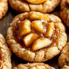 several cookies with caramel toppings are arranged on a table