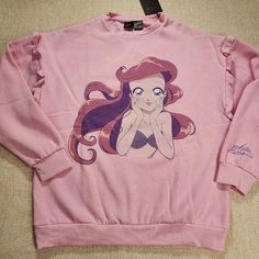 Add This Super Soft And Beautiful Ariel Sweatshirt To Your Closet! Screen Printed Anime Ariel On Front Ruffle On Sleeve Embriodered Accents.. Ariel's Signature On Sleeve Crewneck Pullover 60% Cotton 40% Polyester Unisex Fit Size Large Length 28" Width 23" Arm Length 21.5" By Cakeworthy X Disney Brand New With Tags Pink Long Sleeve Disney Top, Princess Anime, Disney Princess Anime, Athletic Sweatshirts, Hoodie Green, Tie Dye Sweatshirt, Sweatshirt Crewneck, Vintage Hoodies, Quarter Zip Sweatshirt