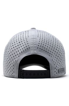 A smart moisture-wicking lining ensures superior comfort in a breathable perforated hat with a glare-reducing visor lining for superior clarity. 2 1/2" brim width Adjustable snapback strap 59% nylon, 34% micropolyester, 7% elastane or polyester/spandex Spot clean Imported Casual Snapback Trucker Hat For Golf, Casual Golf Snapback Trucker Hat, Casual Golf Trucker Snapback Hat, Breathable Baseball Cap With Curved Visor, Gray Baseball Cap Snapback For Sports Events, Gray Snapback Baseball Cap For Sports Events, Adjustable Breathable Trucker Hat With Curved Brim, Breathable Trucker Hat With Adjustable Fit And Curved Brim, Breathable Snapback Hat With Curved Bill For Outdoor