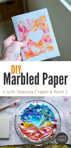 someone is making marbled paper with shaving cream and paint for valentine's day