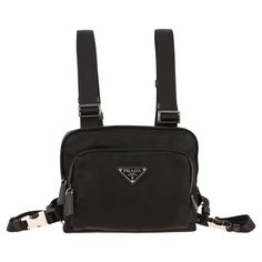 For Sale on 1stDibs - Prada nylon harness bag with saffiano details and adjustable shoulder straps with metallic buckles. It features front zip bag with zip compartment, zip Harness Bag, Camera Harness, Vest Bag, French Shoes, Charlotte Olympia Shoes, City Backpack, Flap Backpack, Prada Nylon, Prada Logo