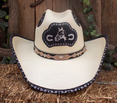 Turn heads when you wear our beautiful handmade cowboy hat . -SIZE MEDIUM FITS  7 , 7 1/8 ,  SIZE LARGE  7 1/4 , 7 3/8 -CROWN 4 1/2 " -BRIM 3 7/8" Custom Hat Bands For Rodeo, One Size Fits Most, Western Style Top Hat For Rodeo With Flat Bill, Western Flat Bill Hat For Rodeo, Western Flat Bill Top Hat For Rodeo, Western Style Flat Bill Hat For Rodeo, Western Style Flat Bill Top Hat For Rodeo, Custom Felt Hat For Rodeo, One Size, Western Top Hat For Rodeo, Handmade Hats For Rodeo