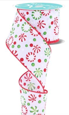 a roll of christmas ribbon with candy canes on it