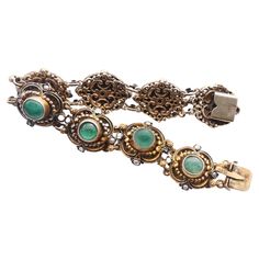 Renaissance styled Austrian – Hungarian or Bohemian Gilt Silver Bracelet hand made circa 1900 - 1920s. Great example of old Austrian - Hungarian jewelry making School. Marks of Swedish Customs confirming metal parts in Gilt at least 835 grade Silver. There are eight natural Green Emerald stones about 7mm average diameter / ca. 2.5 ct each or 20ct total weight + 31 seed pearls and a bit of accenting black colored enamel in this design. Emeralds show Green color of various intensity. Bracelet meas Hungarian Jewelry, Old Rings, Photo Equipment, Crown Jewels, Old Jewelry, Emerald Stone, Seed Pearl, Green Emerald, Dream Jewelry