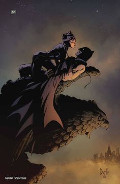 batman and catwoman sitting on top of a dragon in front of the night sky