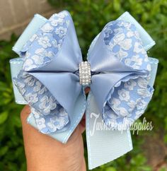 "This is a double ribbon hair bow with a  rhinestone center piece. Alligator clip 75mm Actual item may vary slightly from photo. Measure approx. 5\" Ribbons ends are heat sealed to prevent fraying. NOTE; please never leave small children unintended with hairbows, small parts can be a choking hazard." Dusty Blue Hair, Wedding Hair Bow, Flower Girl Hair Bows, Blue Hair Bow, Blue Wedding Hair, Blue Hair Bows, Pageant Hair, Girls Hair Bow, Fancy Bows