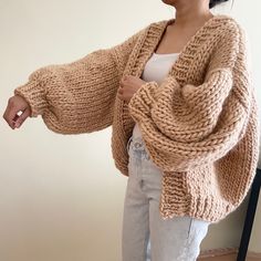 Super soft and comfortable to wear. Made of pure wool 5WP, 1,200-1,300 grams Please feel free to message me for your own custom color and size. Size: Width 29 Inches           Length 21 Inches P.s. Model wearing cardigan is 5'3 / 104 lbs. Made to order takes 1-2 week to knit and shipping. Do not hang, fold and store. Dry clean. Or spot cleaning only dirty area. Or Hand wash only in cold or lukewarm water. Use a delicates hand wash detergent / Give your knits a gentle squeeze and leave in the water for a few minutes / Once done, roll in a clean towel to remove excess water and then dry flat Chunky Knit Sweater Pattern, Autumn Cardigan, Birthday Style, Simple Style Outfits, Knit Wear, Color Sweater, Style Box, Chunky Cardigan, Chunky Knit Cardigan