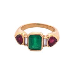 "Ethereal Emerald and Ruby 18K Gold Ring Indulge in the captivating beauty of our \"Ethereal Emerald and Ruby 18K Gold Ring. Set in luxurious 18K gold, the enchanting colors of the emeralds and rubies come to life, emanating a sense of timeless elegance. Weighing 8.20 grams, this ring offers a comfortable and substantial feel on your finger, making it perfect for everyday wear or special occasions. Selling Price: $ 15999.00 Appraisal Price: $ 23999.00" Luxury Multi-stone Emerald Ring For May Birthstone, Green Ruby Ring Formal Fine Jewelry, Green Multi-stone Ruby Ring, Fine Jewelry, White Gold Emerald Ring, Emerald Statement Ring, Vintage Emerald Engagement Ring, Emerald Style, Emerald Wedding Rings, Emerald Ring Gold